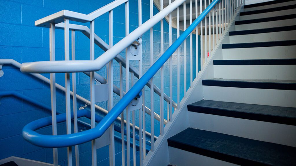 Stairwell in blue, Eastern Mennonite School's color.