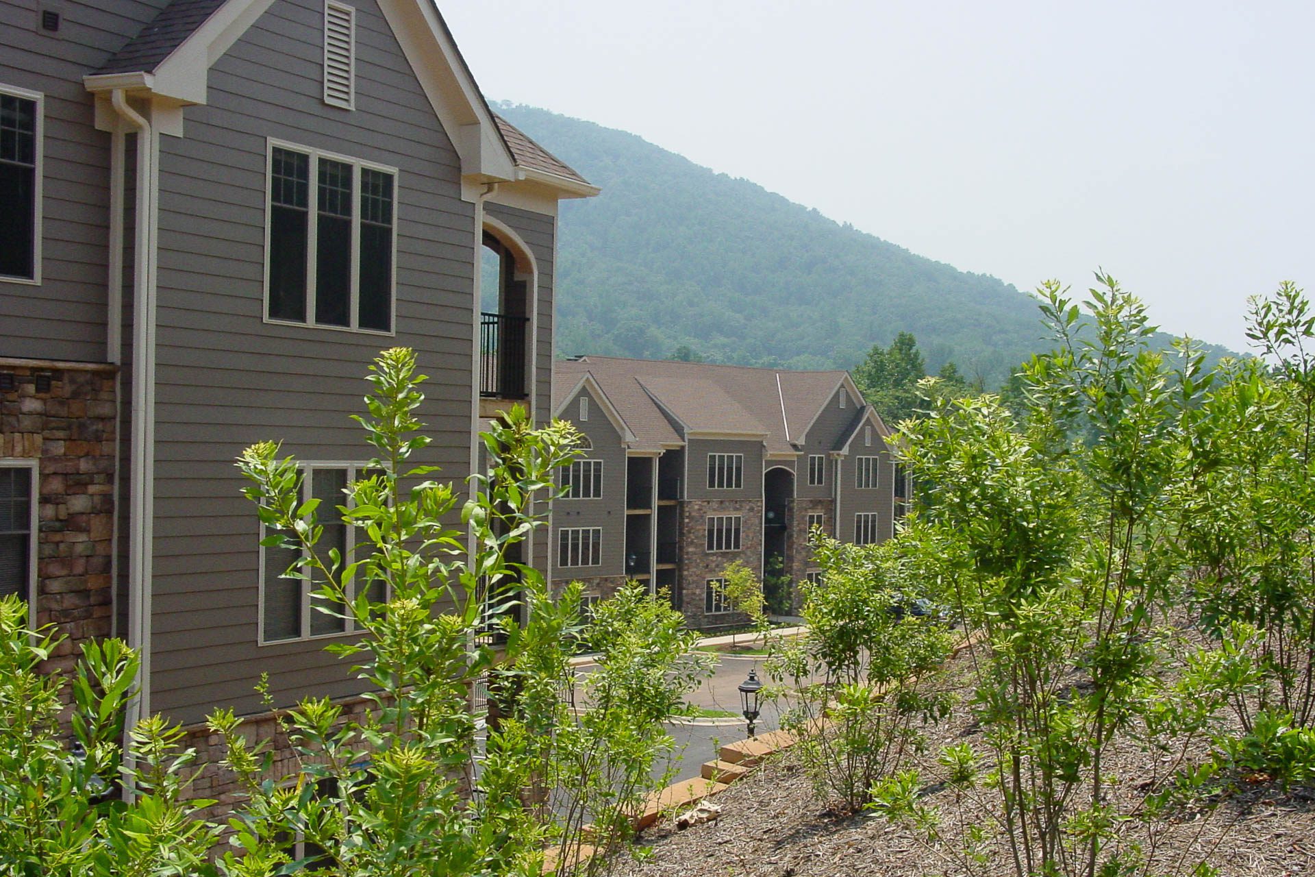 Stone Creek Village Apartments exterior and mountain view